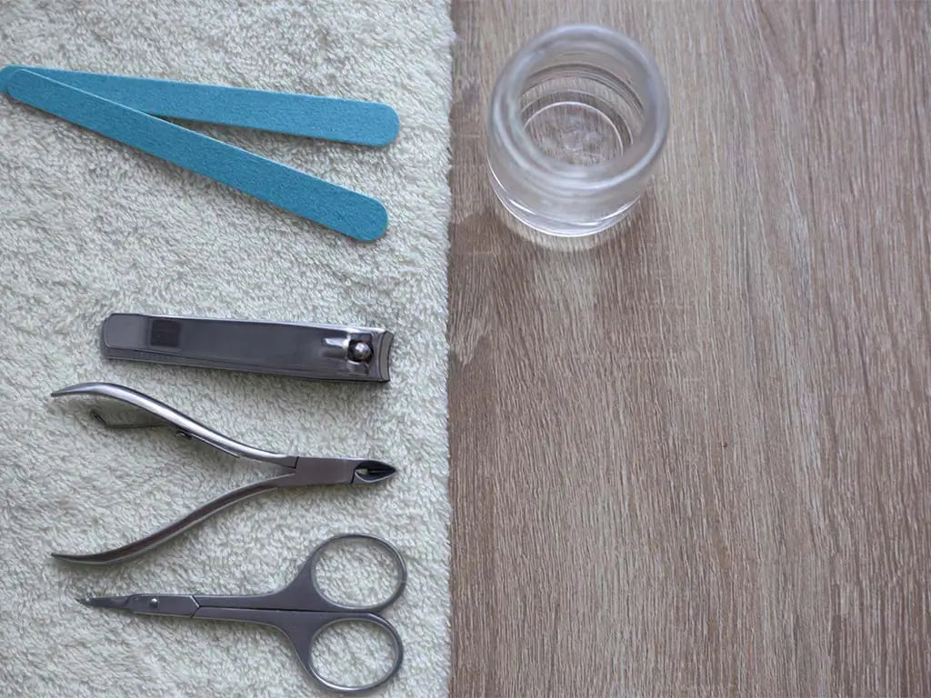 Pedicure tools including nail clippers, files, scissors, and cuticle nippers